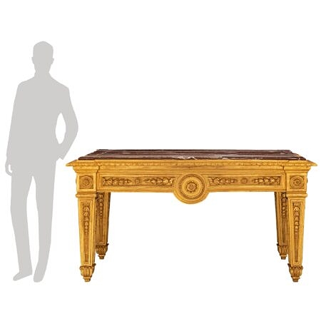 A French 19th century Louis XVI st. giltwood and Campan Rubané marble center table