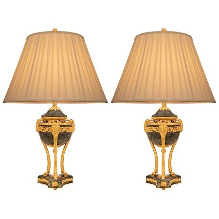 A pair of French 19th century Louis XVI st. Belle Époque period Vert Antique marble and ormolu lamps