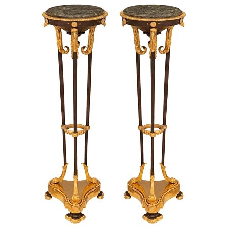 A pair of French turn of the century patinated bronze, ormolu and Vert de Patricia marble pedestals