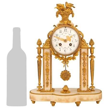 A French 19th century Louis XVI st. white Carrara marble and ormolu clock signed Tiffany