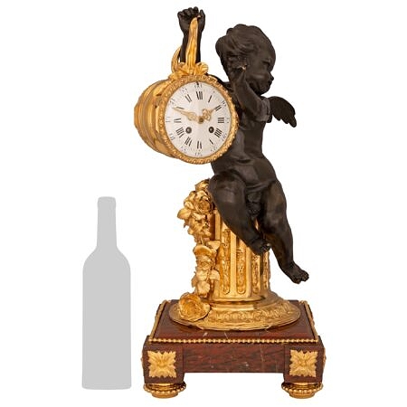 A French 19th century Louis XVI st. Belle Époque period patinated bronze, ormolu and Rouge Griotte marble clock attributed to Henry Dasson