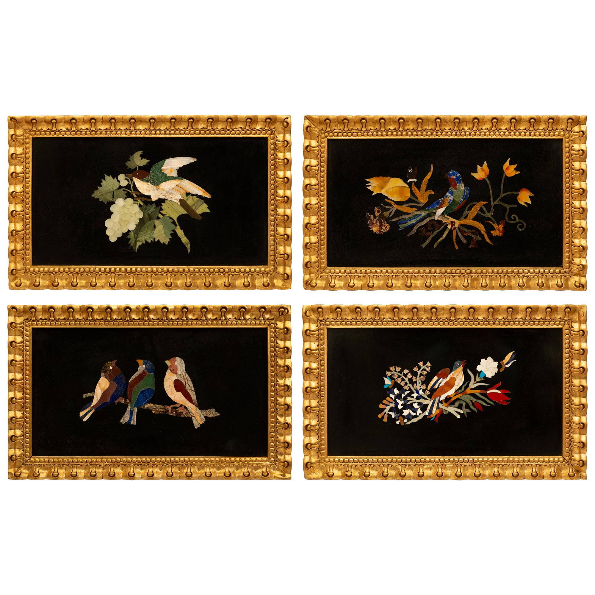 A Complete Set Of Four Italian 19th Century Florentine St. Pietra Dura  Marble And Giltwood Wall Plaques