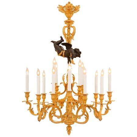 A French 19th century Louis XVI/XV st. Ormolu and patinated Bronze chandelier